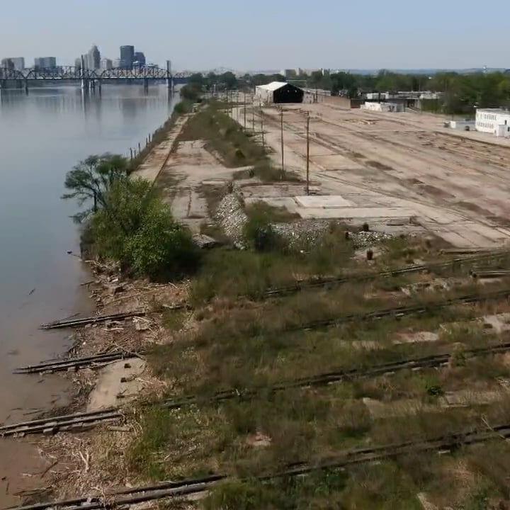 Renderings show possibilities for retail, housing, marina at old Jeffboat site along Ohio River